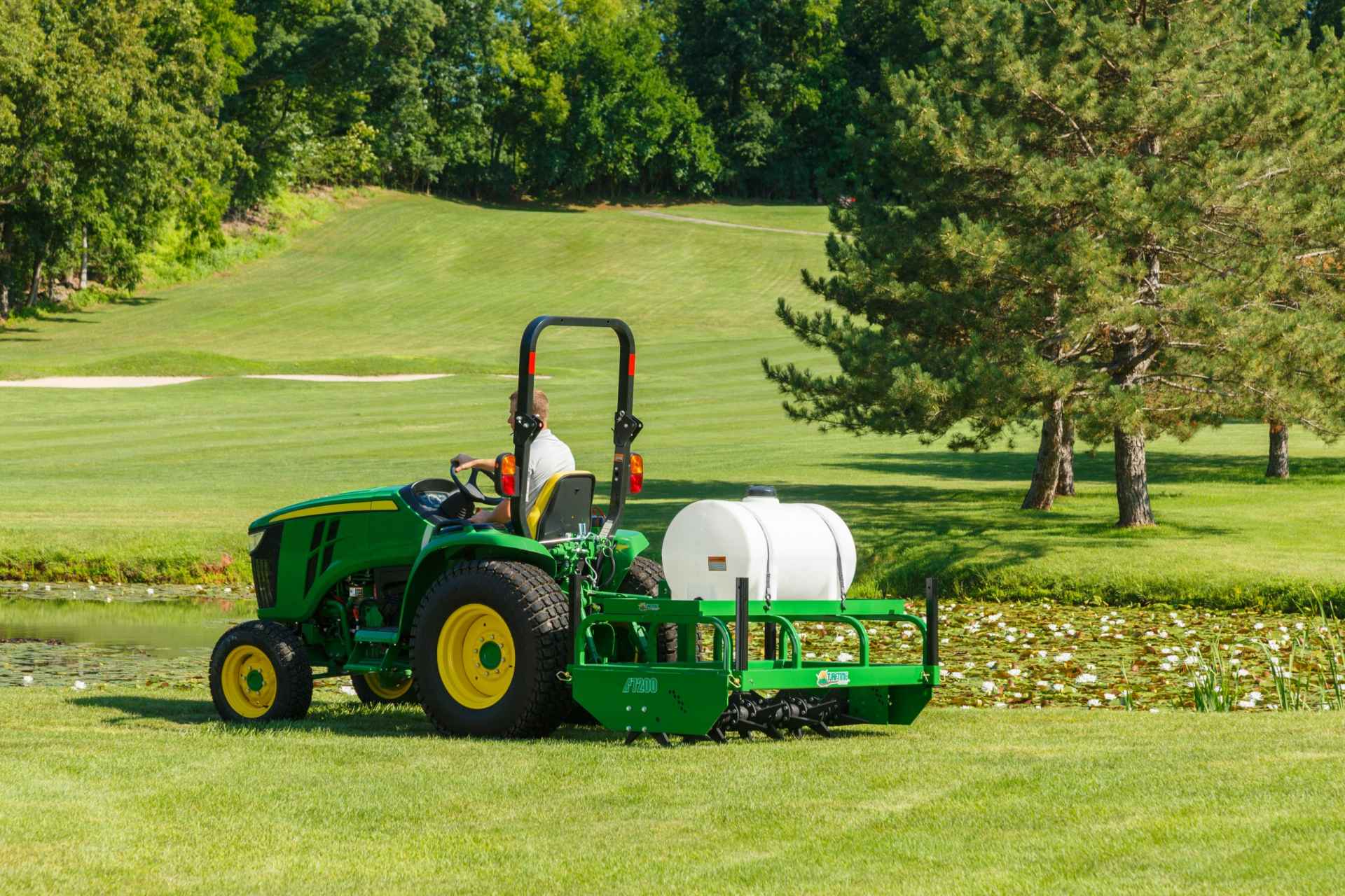 Aerator machine in grass