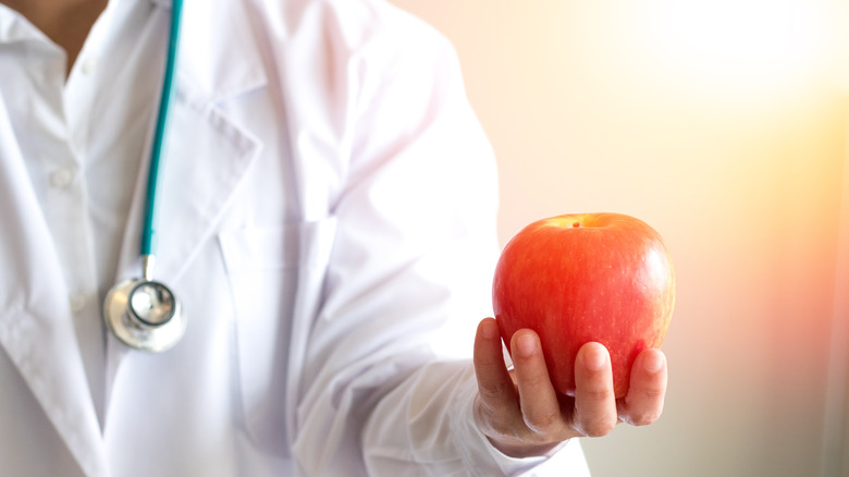 Here's What Actually Happens When You Eat An Apple Every Day